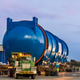 Illustration for article titled See How Boeing Moves This Gigantic Autoclave To A New Factory